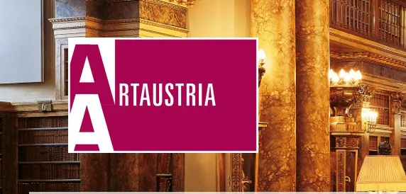 art-austria Logo of "Art Austria" over a richly decorated library interior with ornate furnishings and warm lighting.